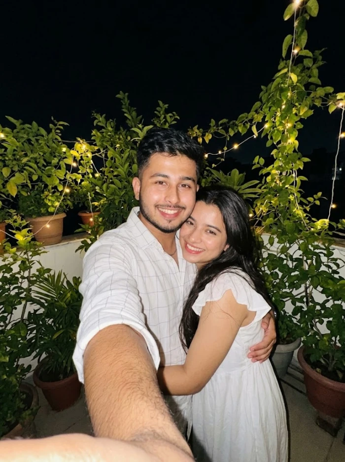 Fairy-Light Rooftop Couple Selfie sample